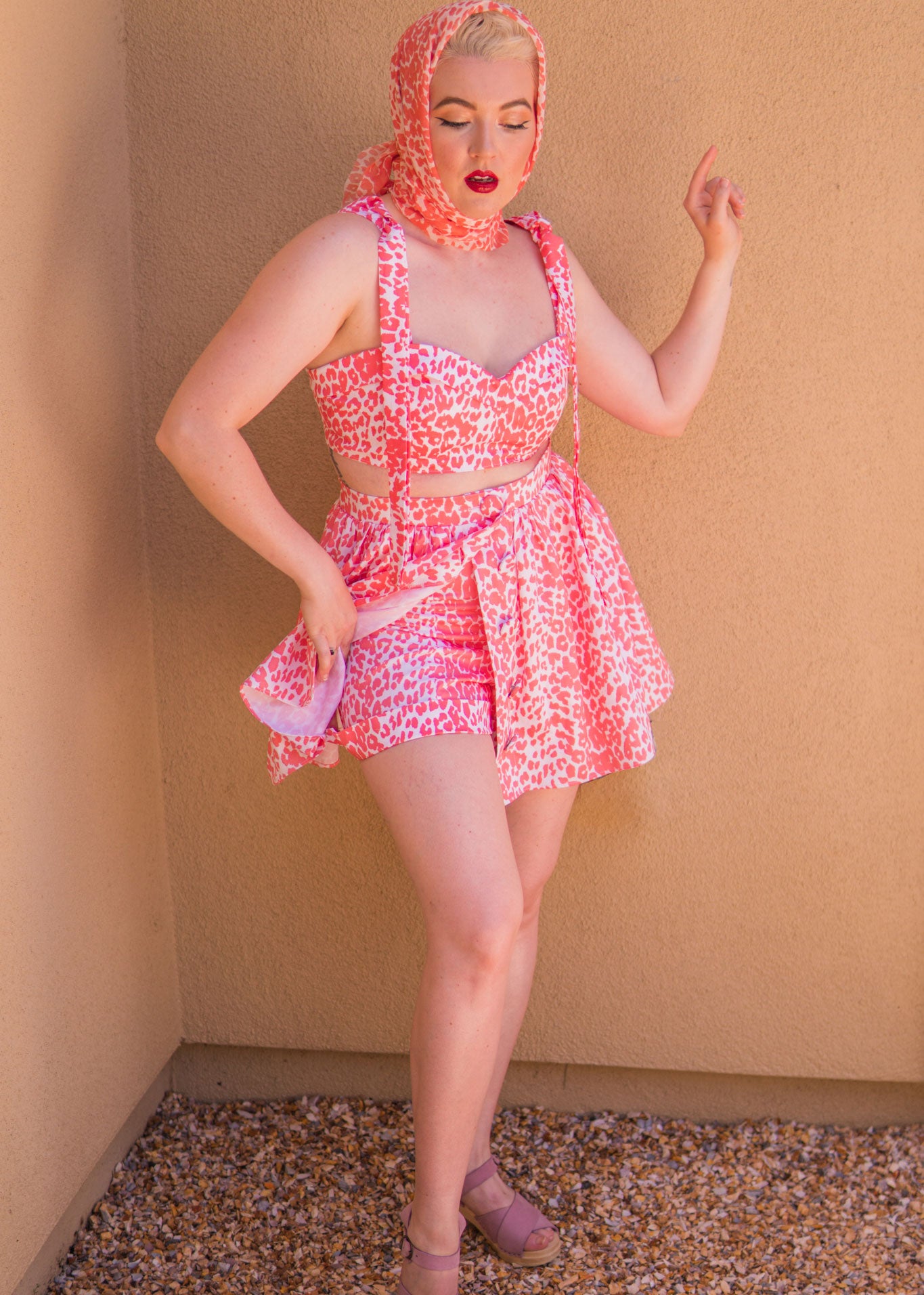 The Eartha Playsuit - Coral Pink Leopard Print