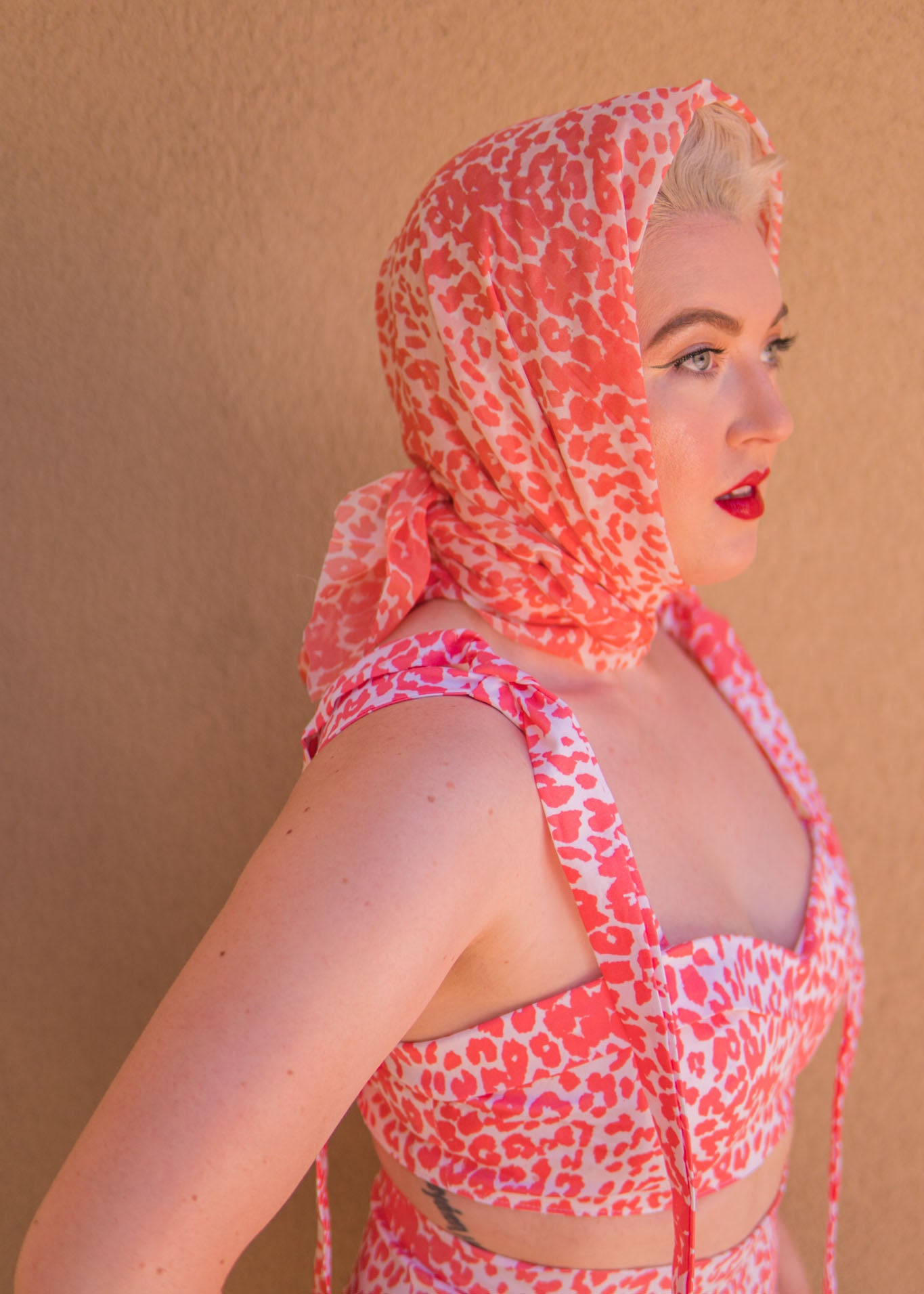 The Eartha Playsuit - Coral Pink Leopard Print