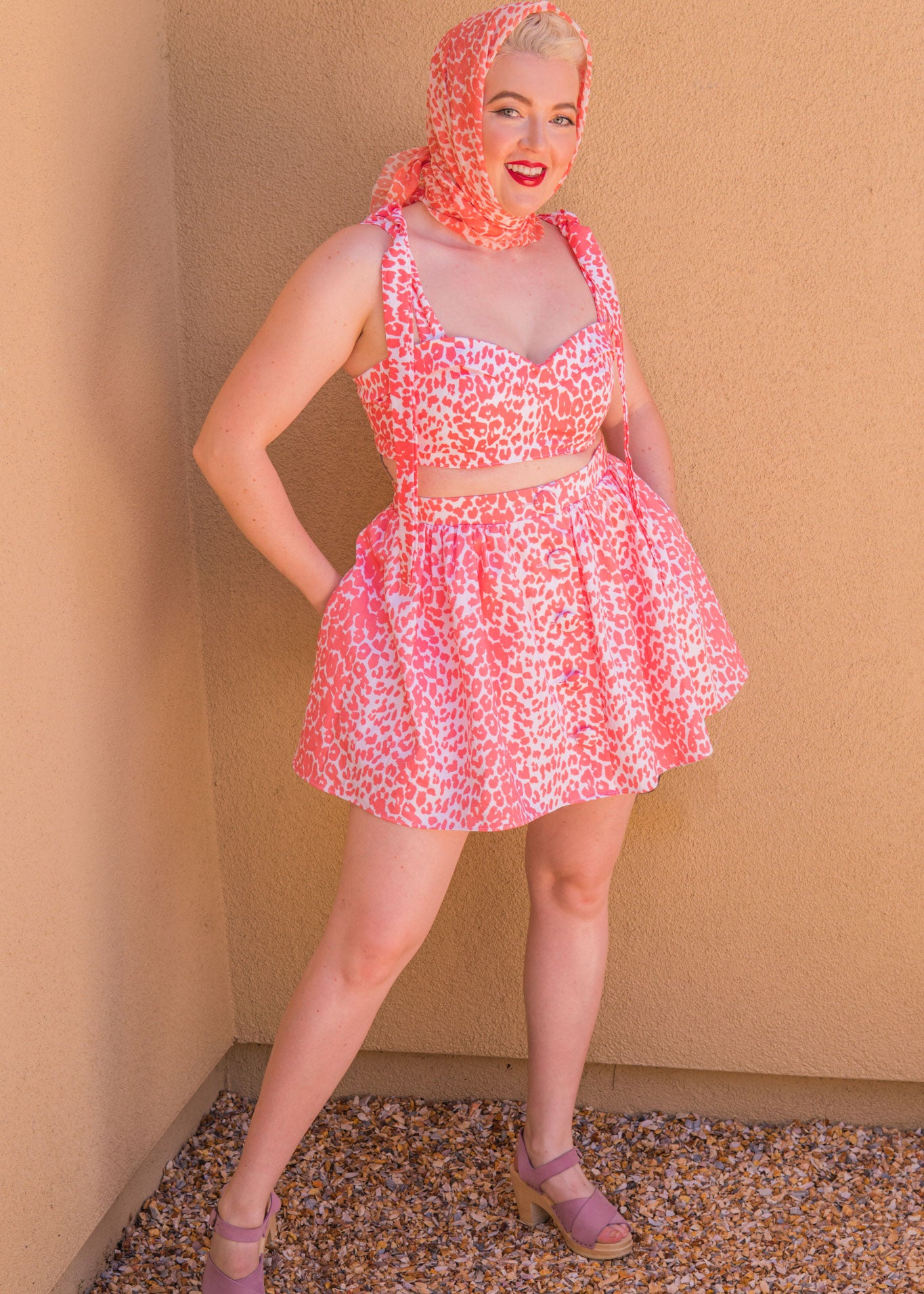 The Eartha Playsuit - Coral Pink Leopard Print