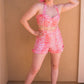 The Eartha Playsuit - Coral Pink Leopard Print